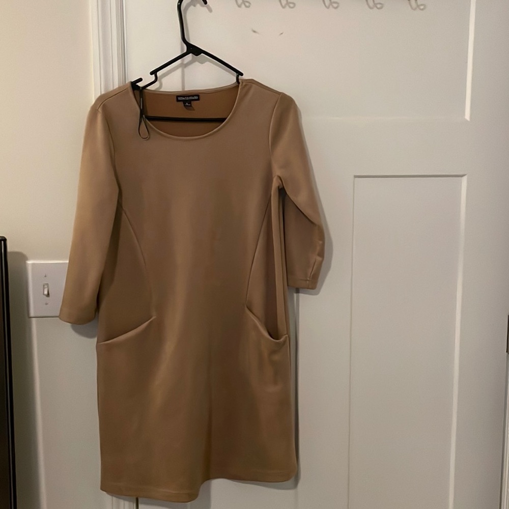 Small, long sleeve with pockets, never worn